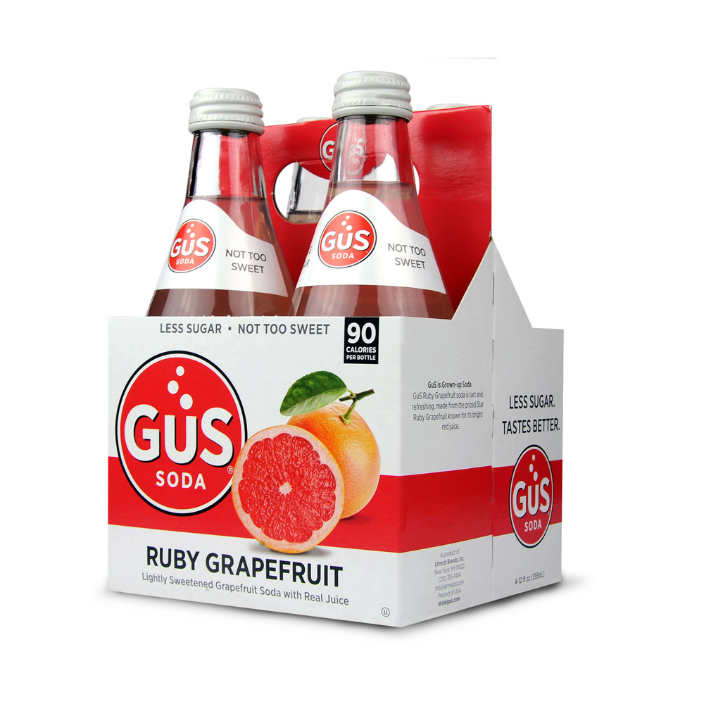 Four pack of bottles of GUS soda ruby grapefruit