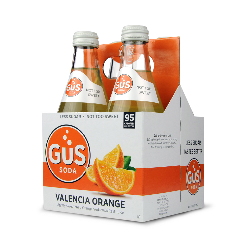 Four pack of bottles of GUS soda valencia orange