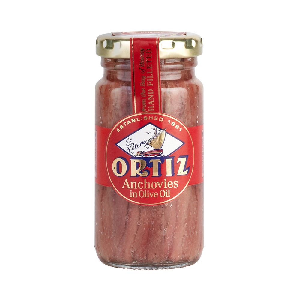 A jar of Conservas Ortiz anchovies in olive oil