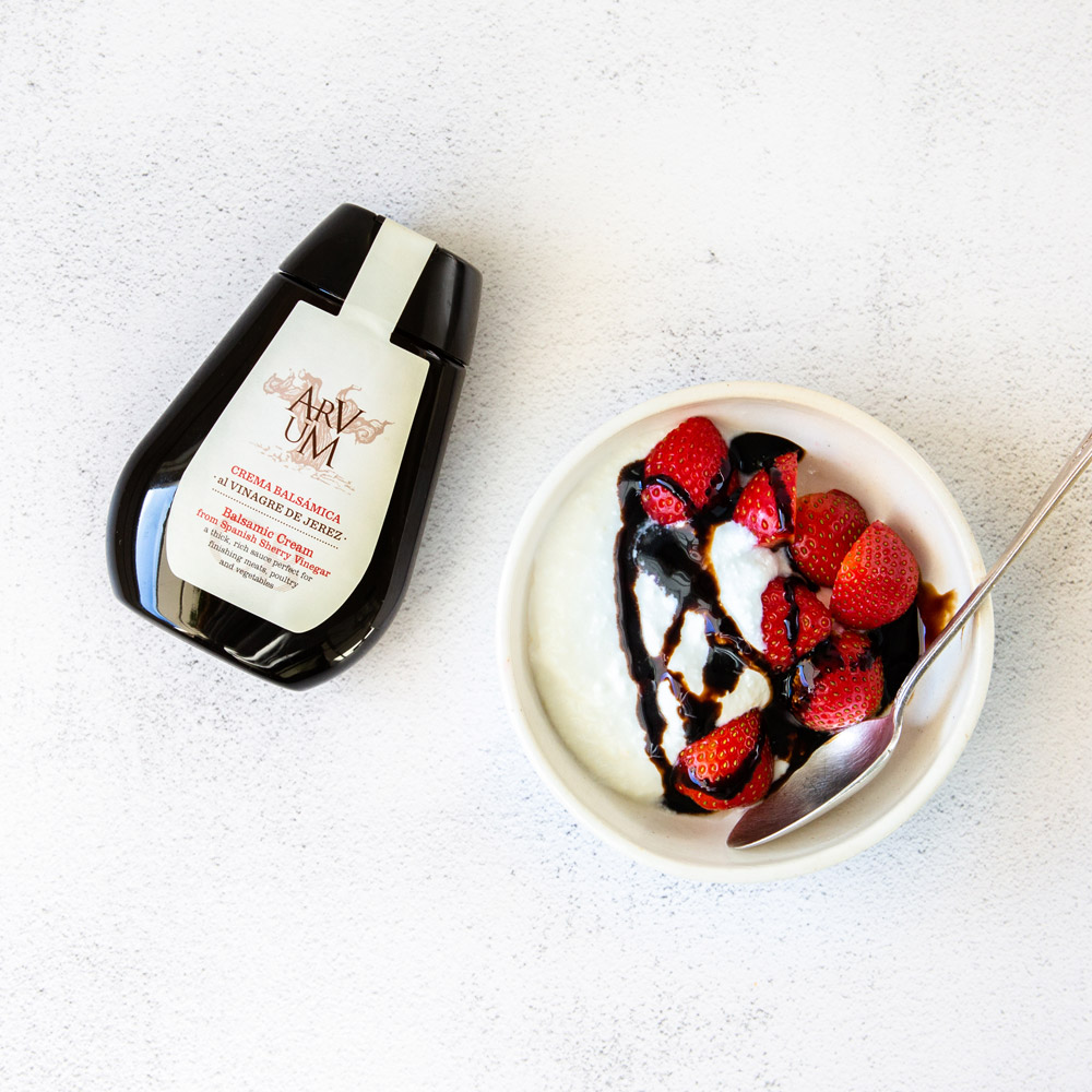 arvum balsamic cream on strawberries and cream in bowl