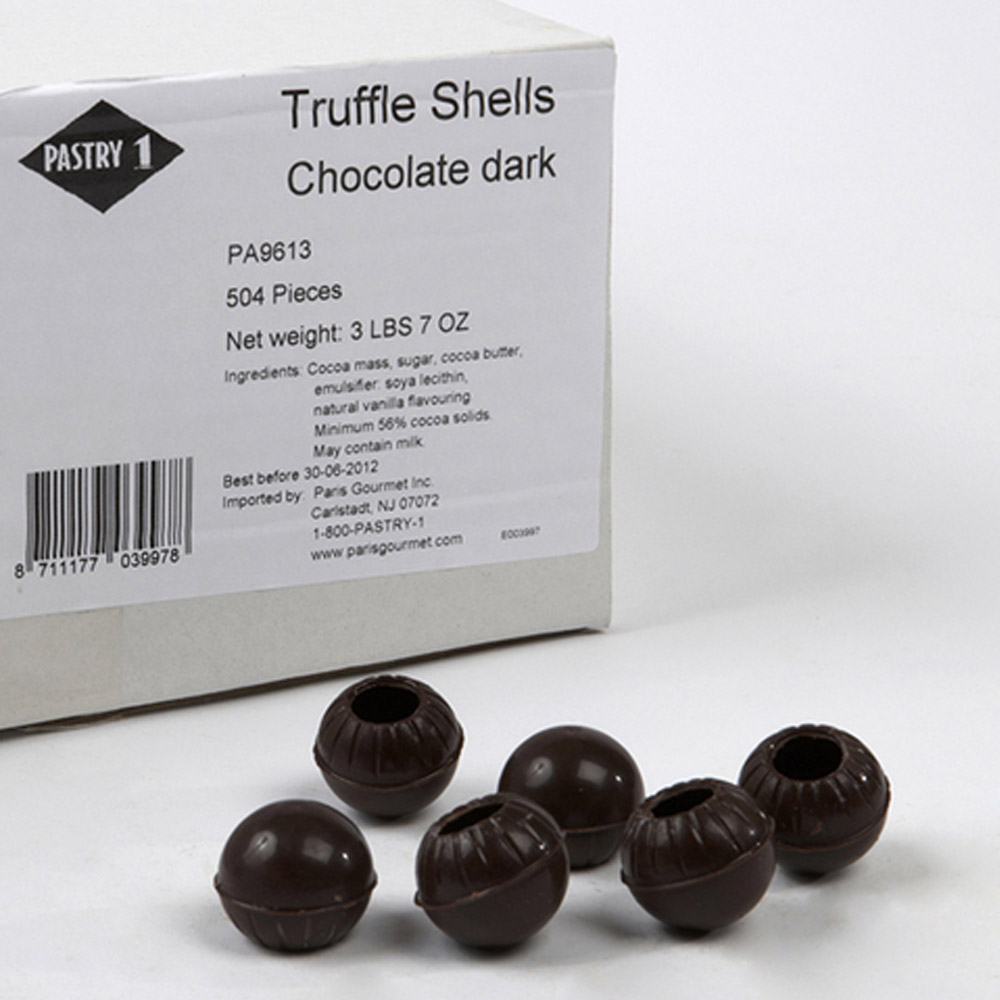 Pastry 1 dark chocolate truffle shells next to a box