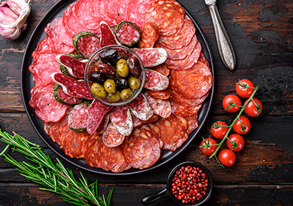 Charcuterie boad with meats and olives