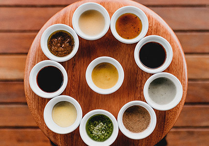 An array of condiments and spreads