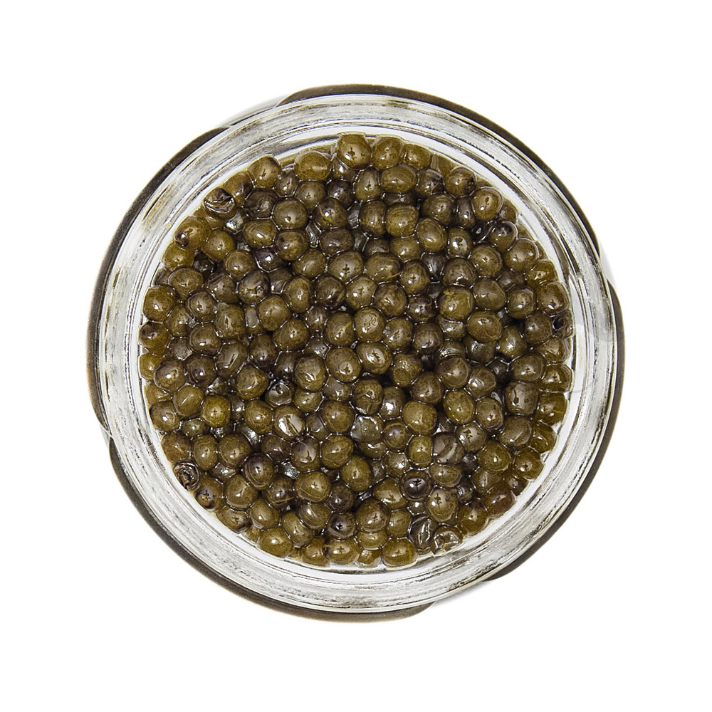 An open jar of classic osetra caviar