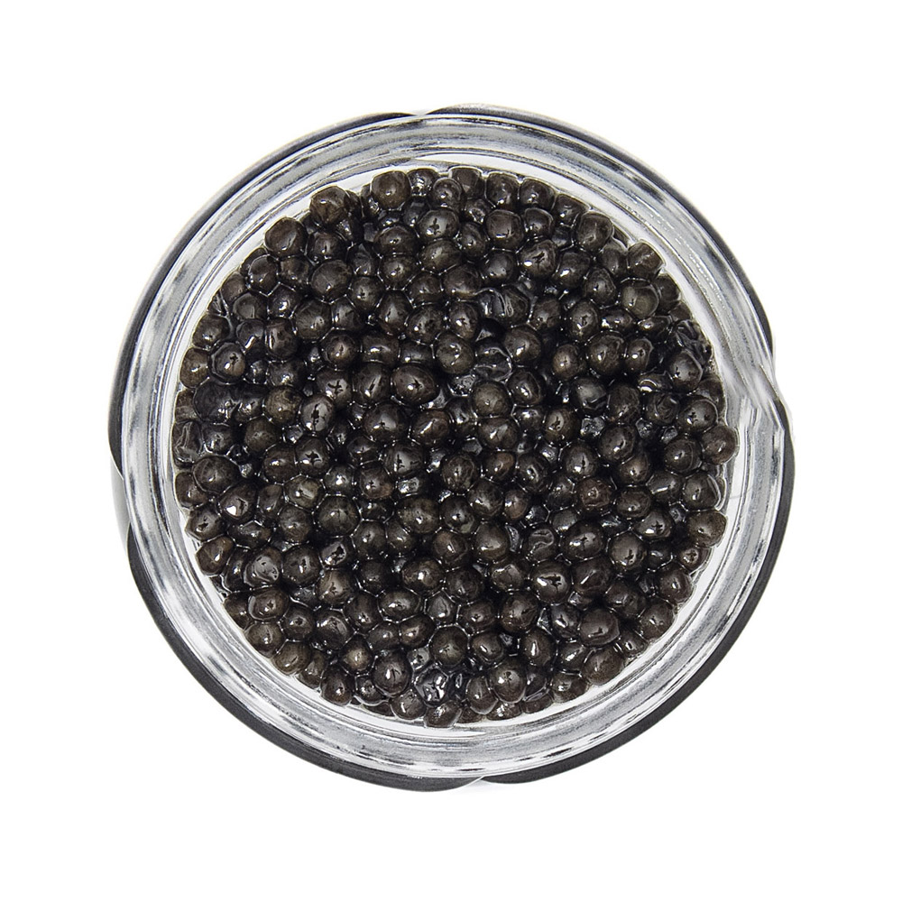 An open jar of supreme Osetra caviar